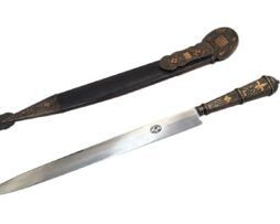 Cuchillo Solingen Guazubirá de 36 cm con hoja de acero, mango en oro y plata y vaina artesanal con puntera y bocavaina